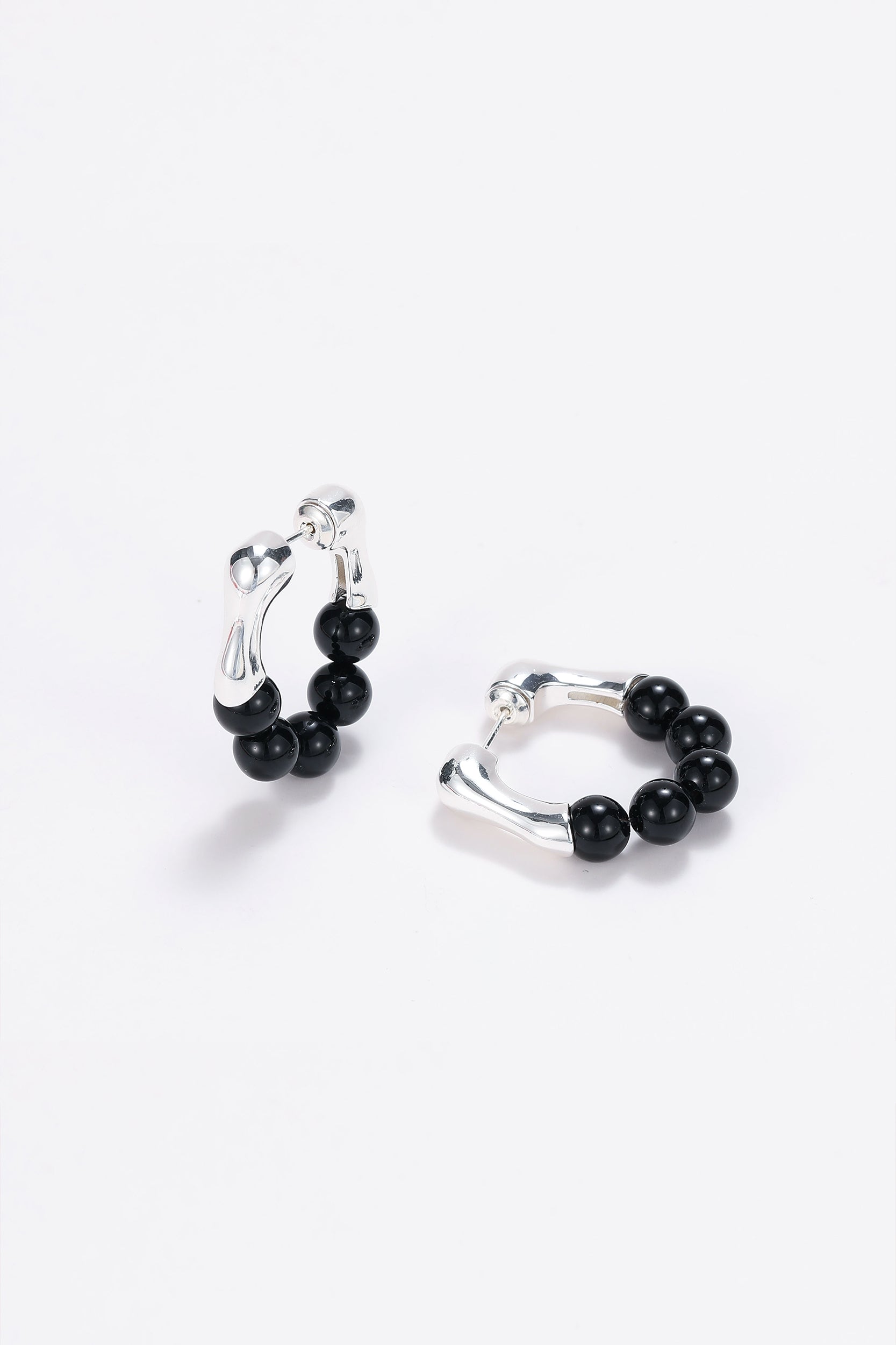 Magma silver onyx hoop earrings