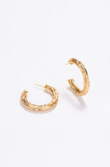 Swirl gold-pleated hoop earrings