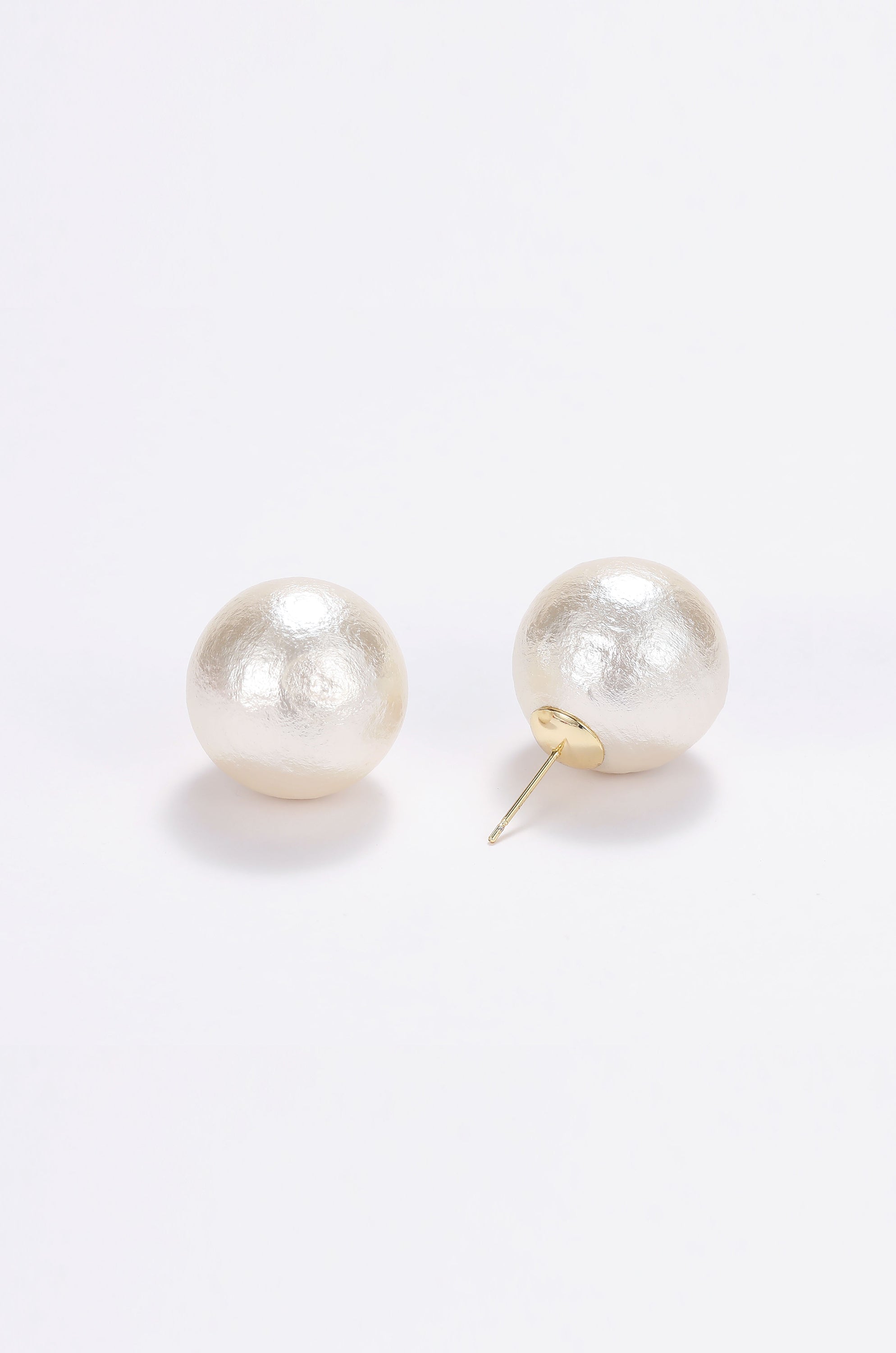Large pearl stud earrings