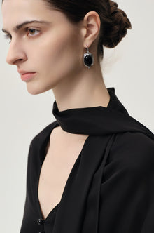 Silver onyx oval drop earrings