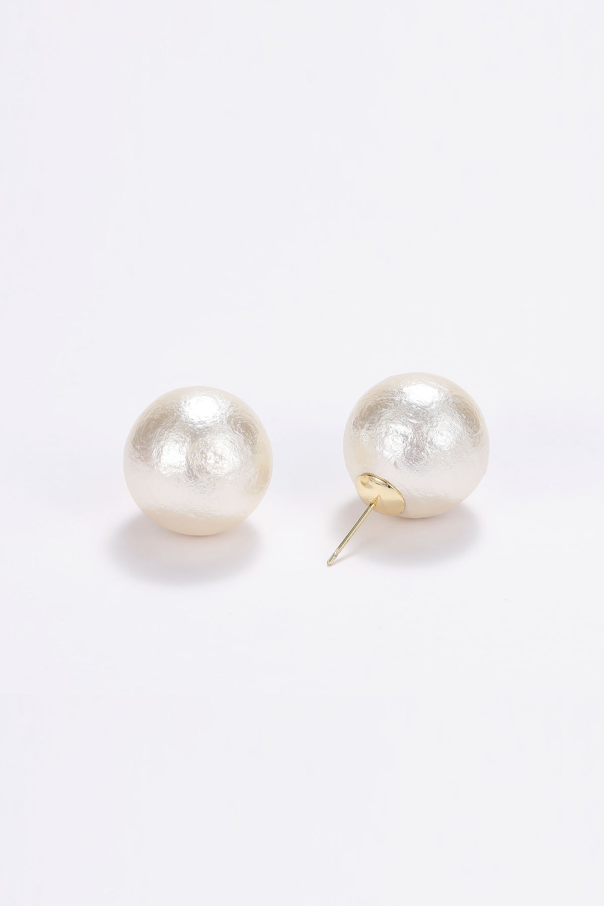 Large pearl stud earrings